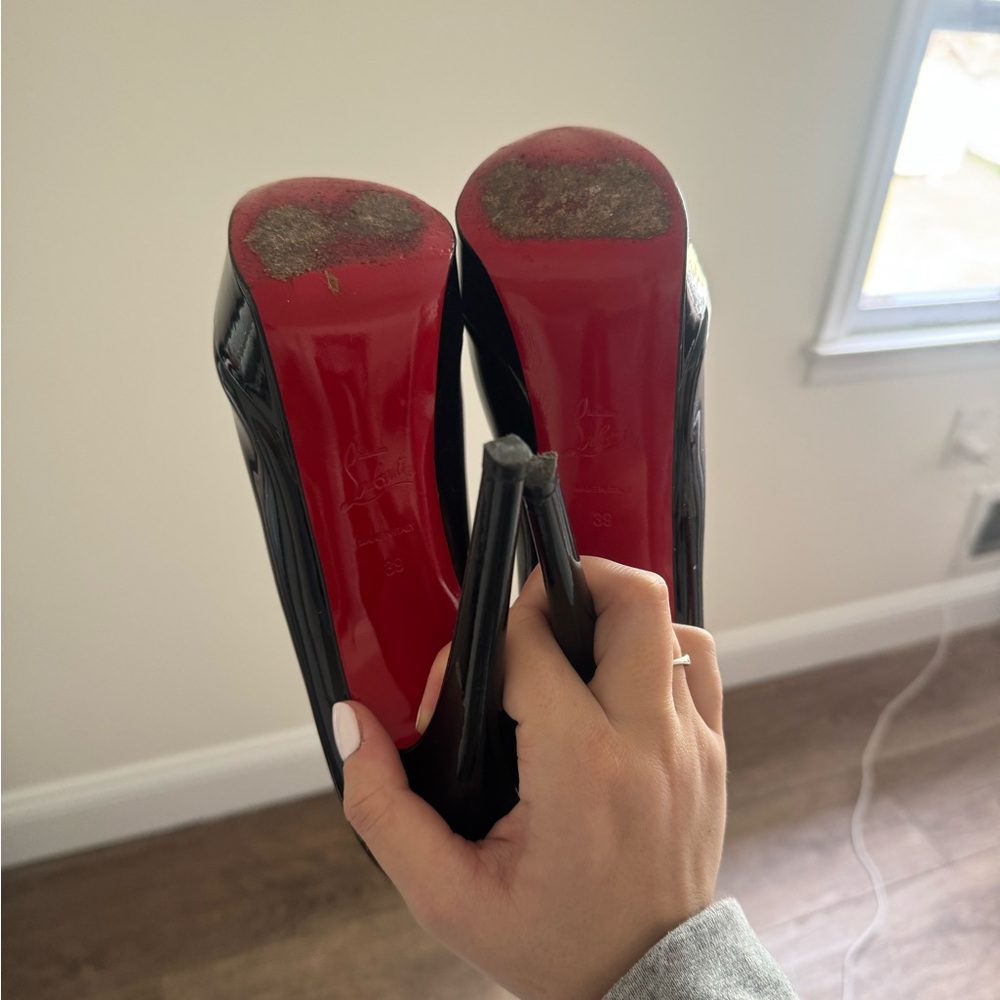 Christian Louboutin Black Patent Stiletto Pumps with Signature Red Soles